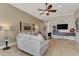 Gathering room with sectional sofa and built-in entertainment center at 13033 N Marsh Dr, Port Charlotte, FL 33953
