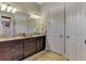 Elegant bathroom with granite countertops and a double vanity at 13033 N Marsh Dr, Port Charlotte, FL 33953
