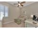 Bright office space with a comfortable couch and work desk at 13033 N Marsh Dr, Port Charlotte, FL 33953