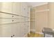 Spacious walk-in closet with ample shelving and drawers at 9307 San Bernandino Ave, Englewood, FL 34224