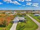 House and surrounding neighborhood from above at 9307 San Bernandino Ave, Englewood, FL 34224