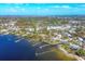 Aerial view of waterfront homes and community at 108 Winson Ave, Englewood, FL 34223