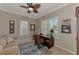 Bright home office with built-in desk and window seating at 2844 Myakka Creek Ct, Port Charlotte, FL 33953