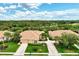 Single-Gathering home with tile roof, 2-car garage, and lush landscaping at 2844 Myakka Creek Ct, Port Charlotte, FL 33953