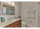 Clean bathroom with single sink, toilet and shower/tub combo at 2844 Myakka Creek Ct, Port Charlotte, FL 33953