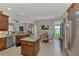Modern kitchen with large island, granite counters and stainless steel appliances at 2844 Myakka Creek Ct, Port Charlotte, FL 33953