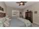 Spacious bedroom with king-size bed and access to backyard at 2844 Myakka Creek Ct, Port Charlotte, FL 33953