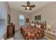 Comfortable bedroom with king-size bed and window coverings at 2844 Myakka Creek Ct, Port Charlotte, FL 33953