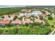 Single-Gathering home with pool, lush landscaping, and waterfront view at 2844 Myakka Creek Ct, Port Charlotte, FL 33953
