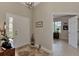 Spacious entryway with view into an adjacent office or sunroom at 2844 Myakka Creek Ct, Port Charlotte, FL 33953