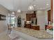 Modern kitchen featuring granite countertops and stainless steel appliances at 2844 Myakka Creek Ct, Port Charlotte, FL 33953