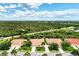 Single-Gathering home with tile roof, driveway, and green lawn at 2844 Myakka Creek Ct, Port Charlotte, FL 33953