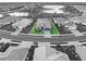 Aerial view of a single-Gathering home with a pool in a residential community at 10985 Trevino St, Englewood, FL 34223