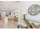 Bright and spacious entryway with a glass-top console table and view into the living area at 10985 Trevino St, Englewood, FL 34223
