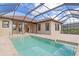 Large screened pool and lanai with access to home at 10985 Trevino St, Englewood, FL 34223