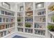 Library with built-in bookshelves at 10985 Trevino St, Englewood, FL 34223