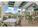 Covered patio overlooking the golf course at 10985 Trevino St, Englewood, FL 34223