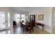 This dining room is filled with natural light and features classic furnishings at 15048 Spanish Point Dr, Port Charlotte, FL 33981