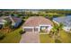 Single-Gathering home with a large driveway at 15048 Spanish Point Dr, Port Charlotte, FL 33981