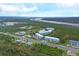 Aerial view of community showing location and surrounding landscape at 3929 Cape Haze Dr # 105, Rotonda West, FL 33947