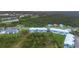 Wide aerial view of the townhouses and surrounding landscape at 3929 Cape Haze Dr # 105, Rotonda West, FL 33947