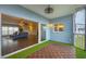 Balcony with sliding glass doors open to the living room at 3929 Cape Haze Dr # 105, Rotonda West, FL 33947