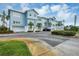 Condo building exterior showcasing architectural details and landscaping at 3929 Cape Haze Dr # 105, Rotonda West, FL 33947