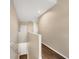 Hallway with wood flooring and neutral walls at 3929 Cape Haze Dr # 105, Rotonda West, FL 33947