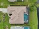 Directly above view of house and pool at 41 Robina St, Port Charlotte, FL 33954