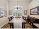 Formal dining room with wood table and chairs at 41 Robina St, Port Charlotte, FL 33954