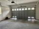 Garage with a large automatic door, offering convenient access at 5160 Farewell St, Port Charlotte, FL 33981