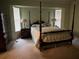 Bedroom with a post bed and wooden dresser at 5160 Farewell St, Port Charlotte, FL 33981