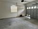 Attached garage featuring an automatic door opener and window at 5160 Farewell St, Port Charlotte, FL 33981