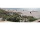 Relaxing beach view with people enjoying a sunny day by the ocean at 5160 Farewell St, Port Charlotte, FL 33981
