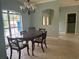 Bright dining room features a table with chairs and a large window at 5160 Farewell St, Port Charlotte, FL 33981
