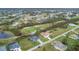 Wide shot of houses and golf course community at 71 Pine Valley Pl, Rotonda West, FL 33947