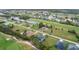 Community overview featuring golf course, lake, and residential properties at 71 Pine Valley Pl, Rotonda West, FL 33947