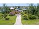 Single-Gathering home with a large backyard and canal access at 9381 St Paul Dr, Port Charlotte, FL 33981