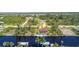Waterfront property with private dock and lush landscaping at 9381 St Paul Dr, Port Charlotte, FL 33981