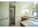 Updated bathroom with granite vanity, shower, and tile flooring at 9381 St Paul Dr, Port Charlotte, FL 33981