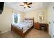 Charming bedroom with a wooden bed and ocean-themed decor at 9381 St Paul Dr, Port Charlotte, FL 33981