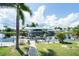 Private dock with covered boat lift and canal access at 9381 St Paul Dr, Port Charlotte, FL 33981