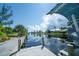 Serene canal view from the dock with lush tropical foliage at 9381 St Paul Dr, Port Charlotte, FL 33981
