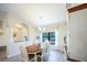 Elegant dining room with oval table and seating for six at 9381 St Paul Dr, Port Charlotte, FL 33981