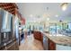 Spacious kitchen with stainless steel appliances and granite countertops at 9381 St Paul Dr, Port Charlotte, FL 33981