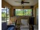 Outdoor lanai with wet bar and comfortable seating at 9381 St Paul Dr, Port Charlotte, FL 33981