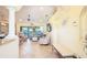 Bright and airy living room with comfortable seating and a view of the pool at 9381 St Paul Dr, Port Charlotte, FL 33981