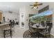 Casual breakfast nook near kitchen with pool and lanai access at 5100 White Ibis Dr, North Port, FL 34287