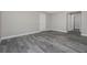 Bright bedroom with gray walls and tile flooring at 450 Albatross Rd, Rotonda West, FL 33947