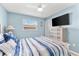 Blue and white bedroom with full bed and coastal decor at 15490 Mccomb Cir, Port Charlotte, FL 33981